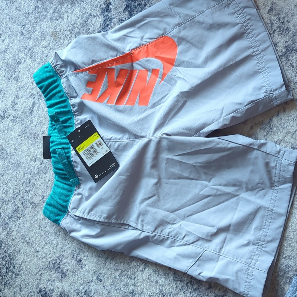 Nike Teal and Gray Shorts with Vibrant Orange Logo